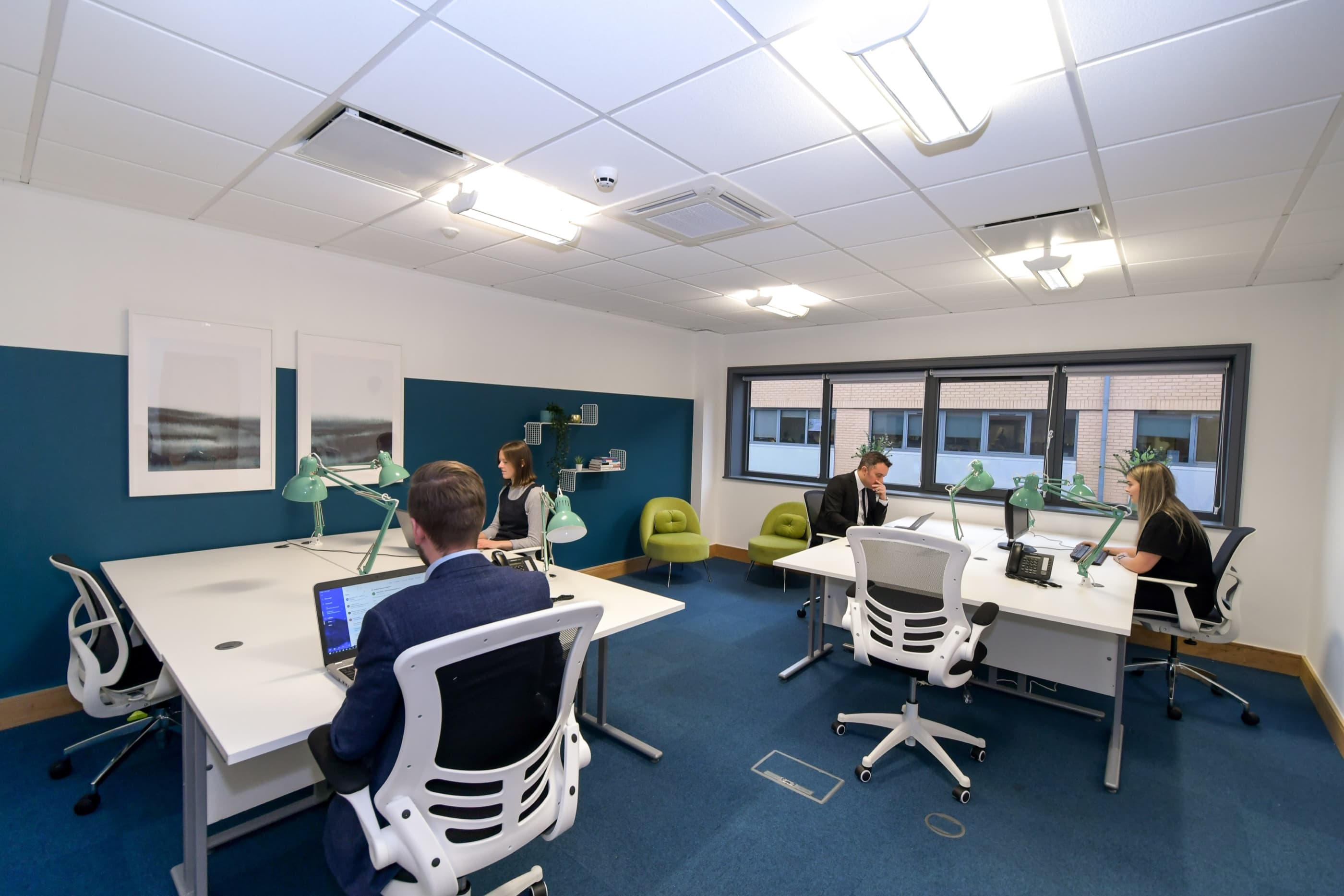 A modern Hope Park serviced office with desks, task lighting and natural light