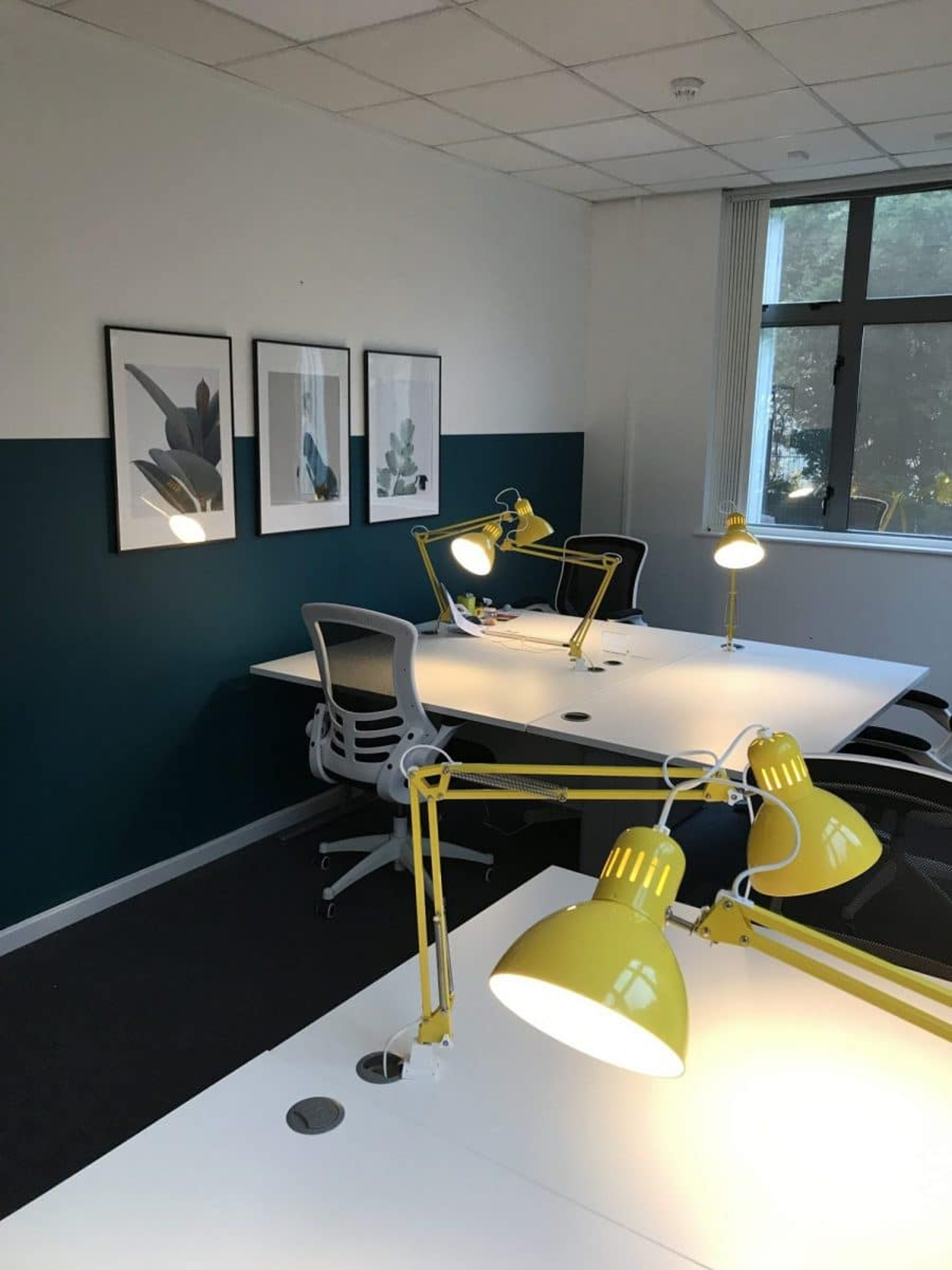 New serviced office furnished with desks and lamps