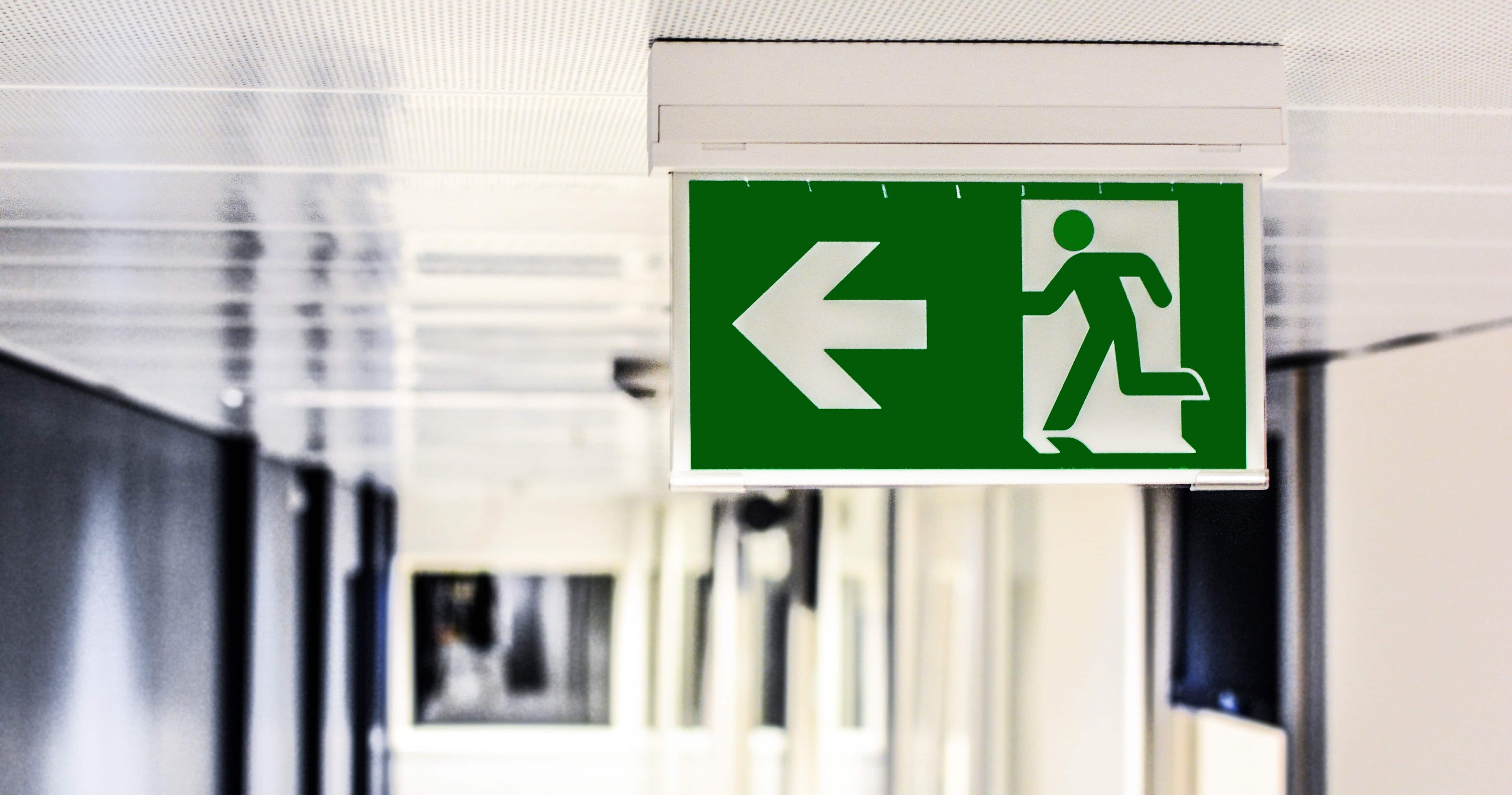 Fire Exit To The Left Sign
